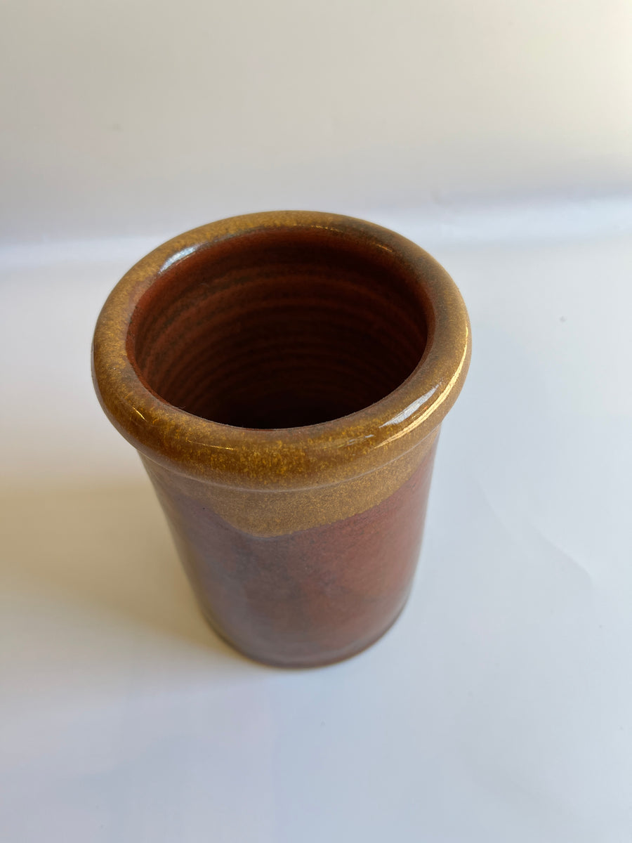 Cylindrical brown glazed vase with defined rim